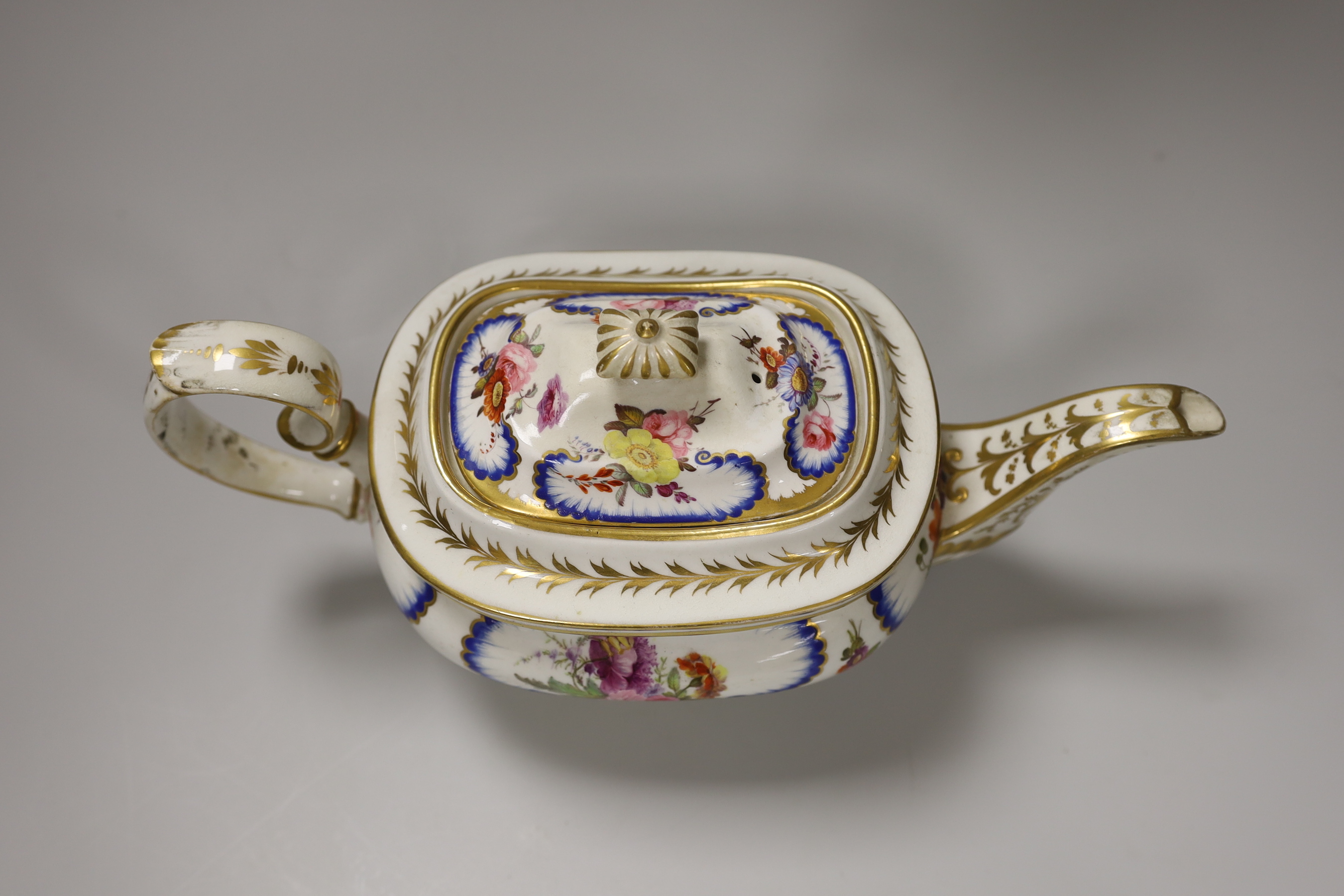 A Derby teapot and cover in Sevres style, hand painted with flowers, 30cm wide